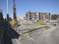 907660 Gezicht op de herinrichtingswerkzaamheden van de kruising van de Draaiweg en de Talmalaan te Utrecht, met op de ...